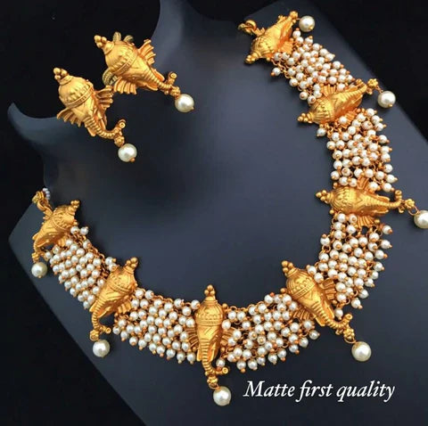 Alankar Gold ganesh necklace set.